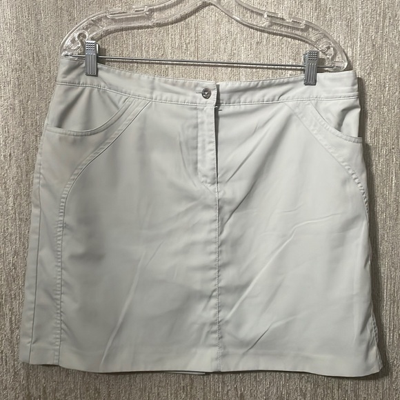 Izod Dresses & Skirts - Beige skirt with shorts underneath